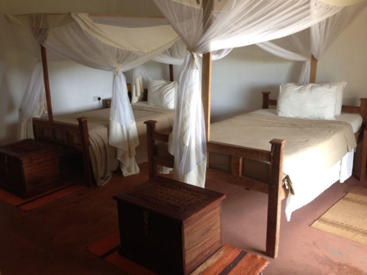 Emerald Bay Resort Kizungu Quarto foto